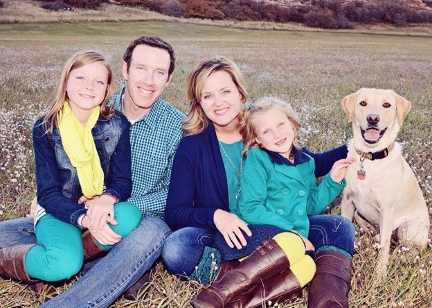 The Rea family and their dog in 2015