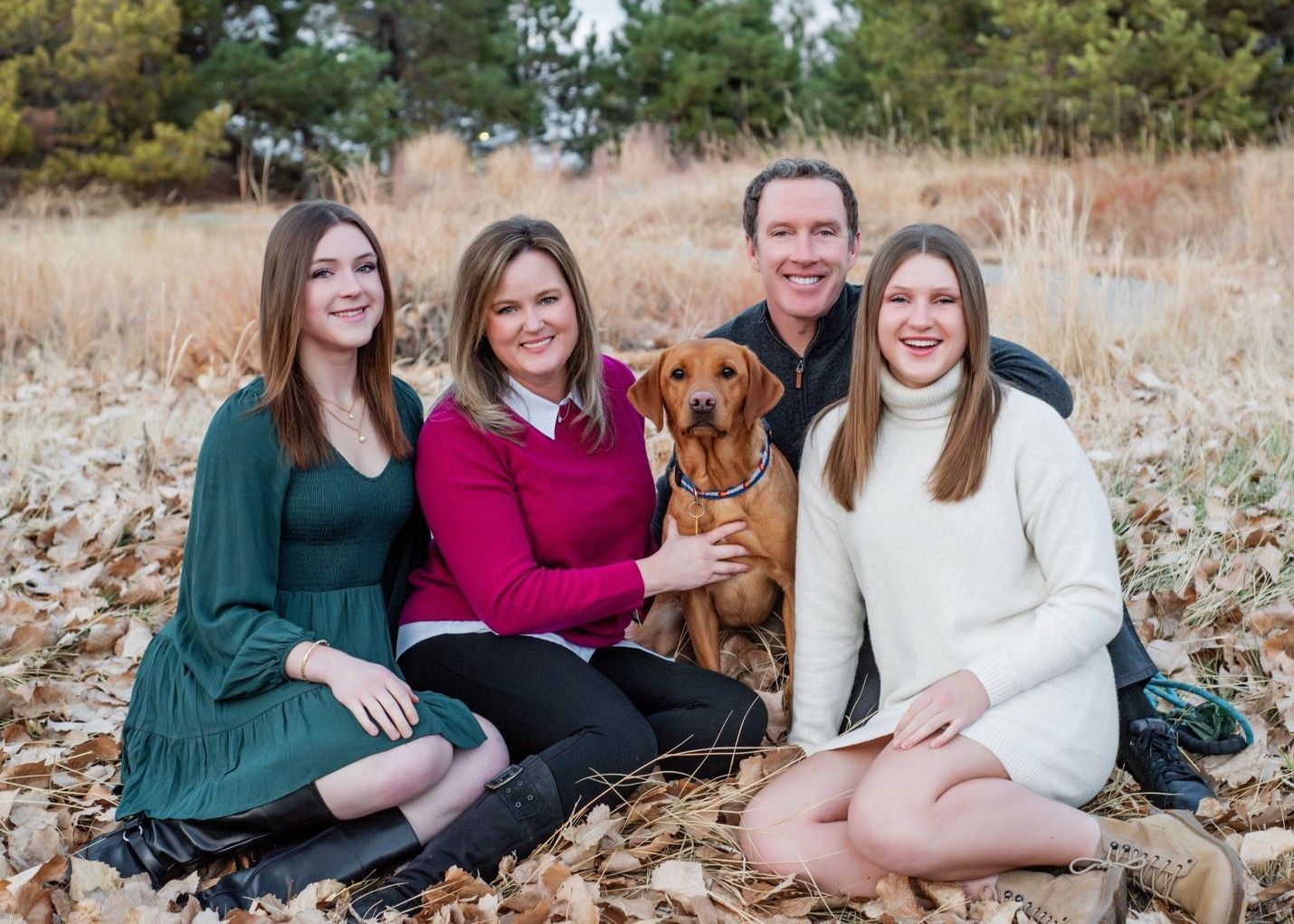 The Rea family and their dog in 2026