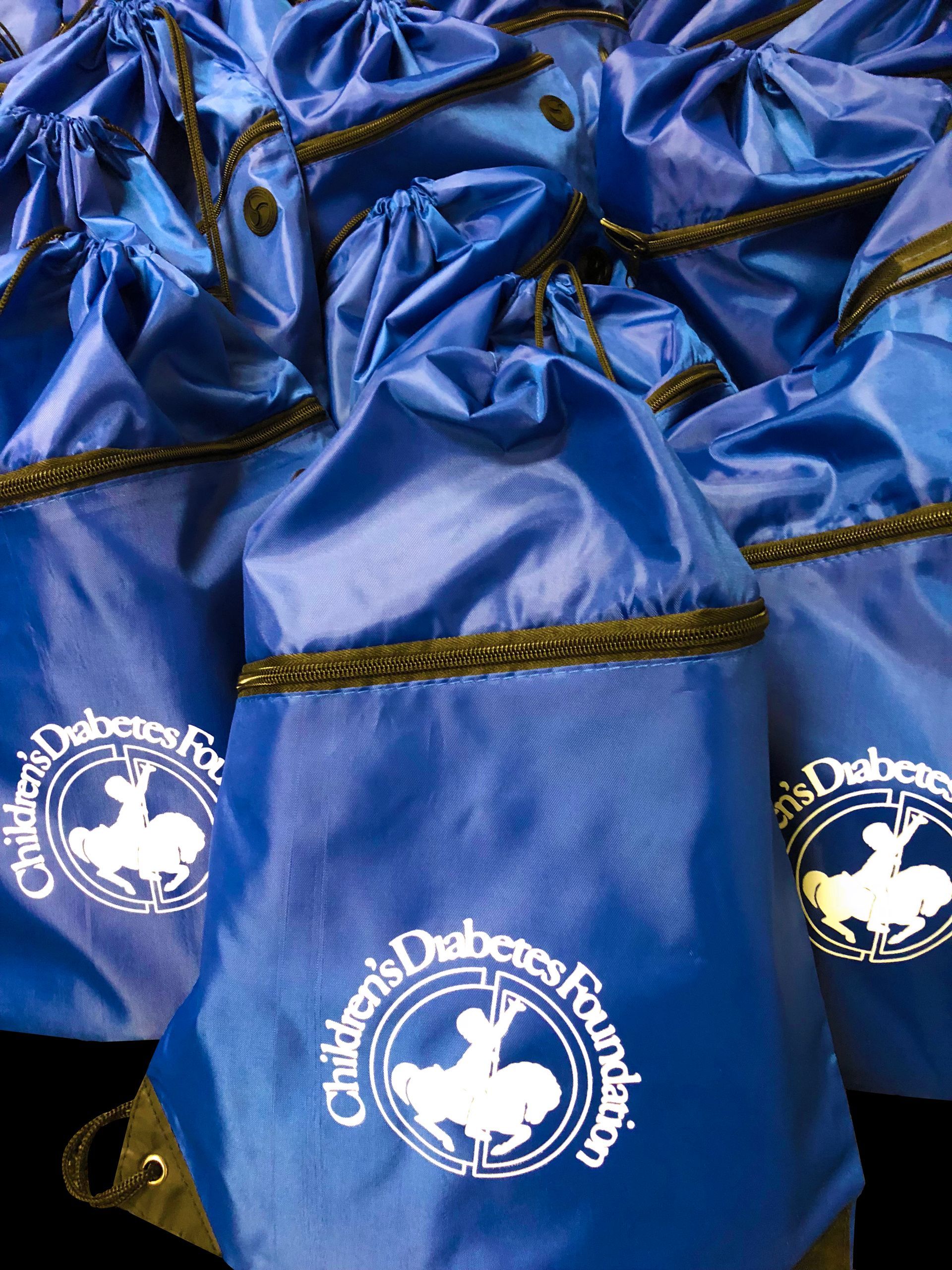 Closeup of a bunch of new onset bags provided to BDC patients by CDF.