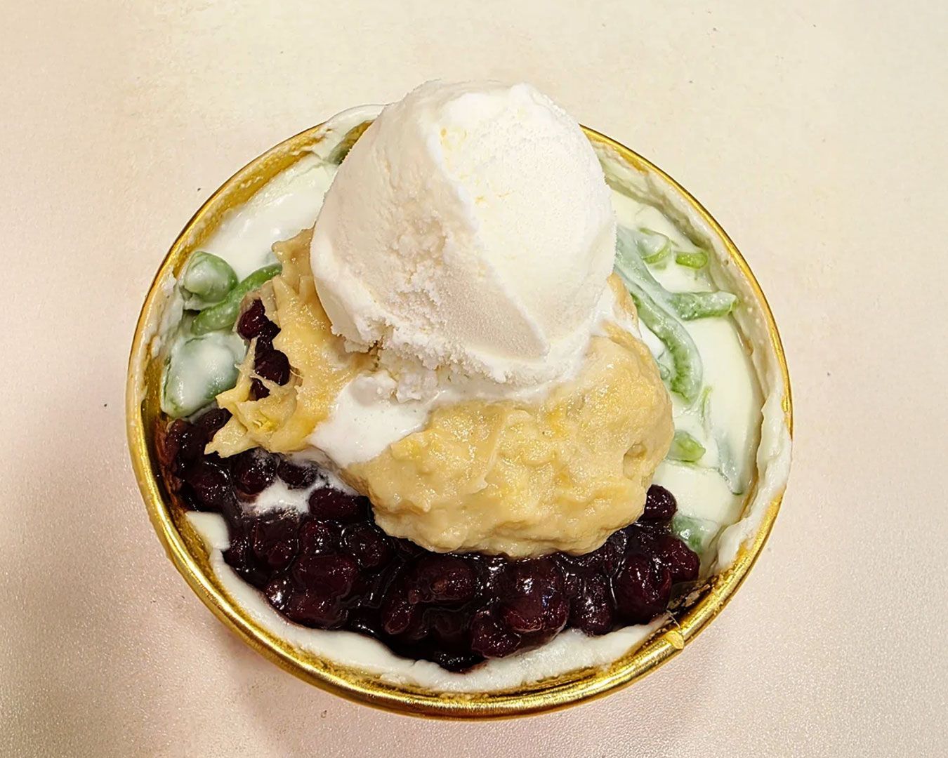 A spread of Asian-style sweets presented in bowls and plates, reflecting heritage flavours and comforting textures.