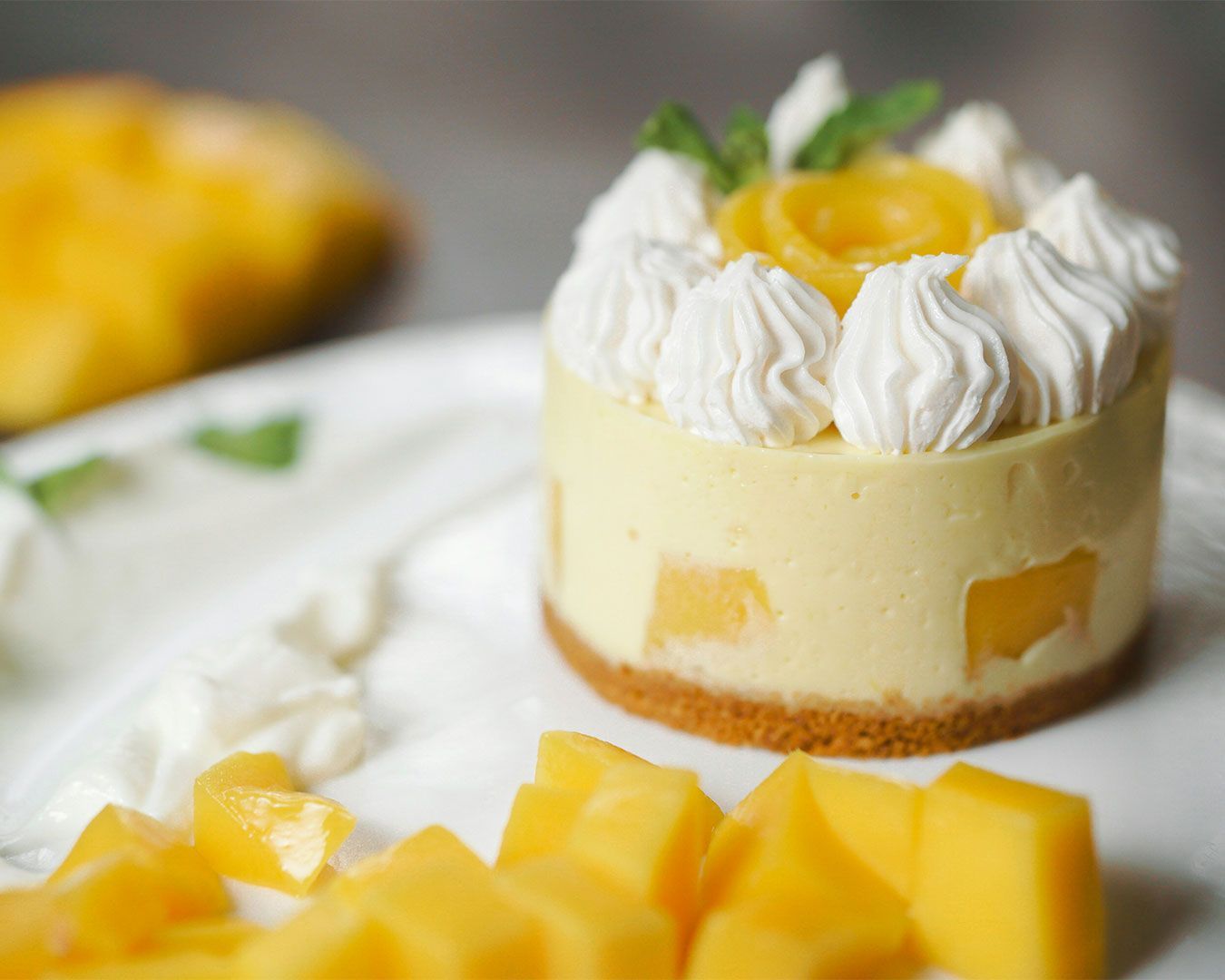A caramelised burnt cheesecake with a soft centre, topped with fresh mango for a tropical twist.