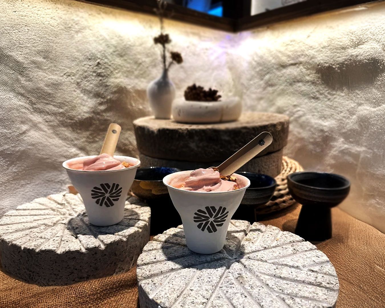 Smooth artisanal gelato served in a cup, showcasing natural colours and handcrafted flavours.