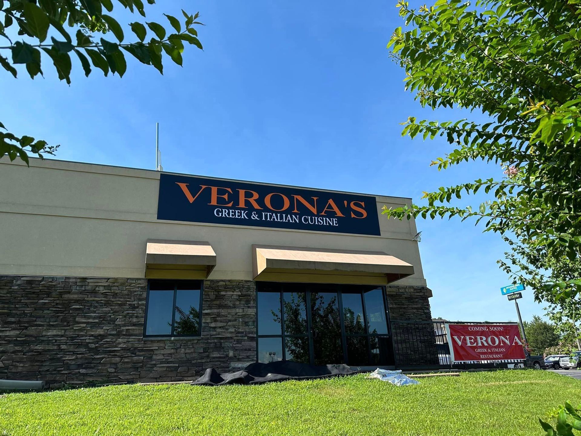 A building with a sign that says verona 's on it