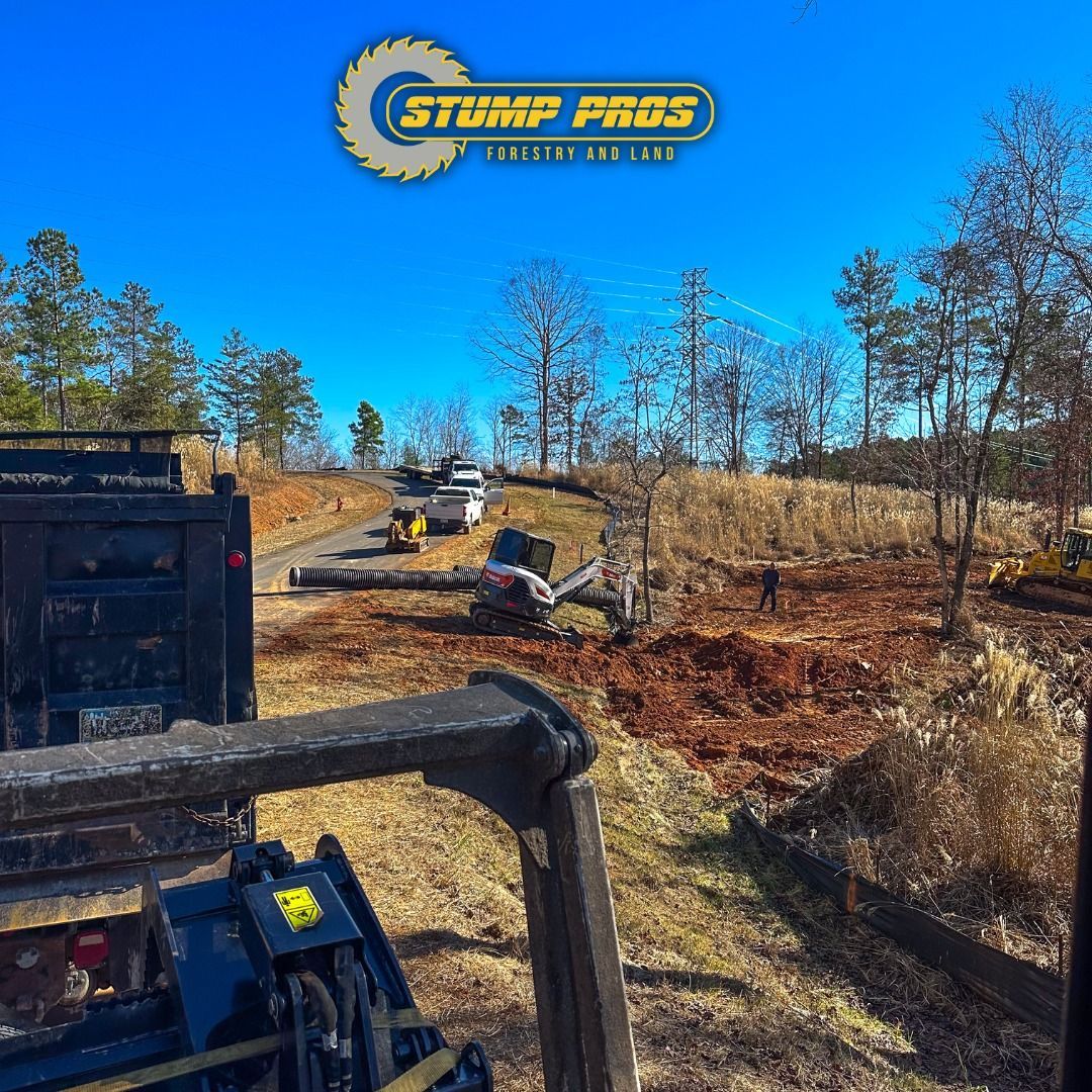 A stump pros logo is on the side of a truck
