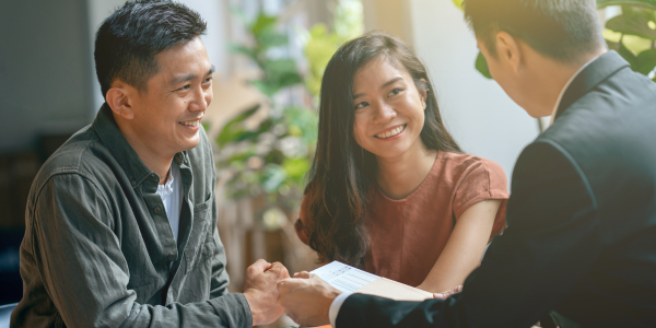 insurance agent discussing annuities with couple