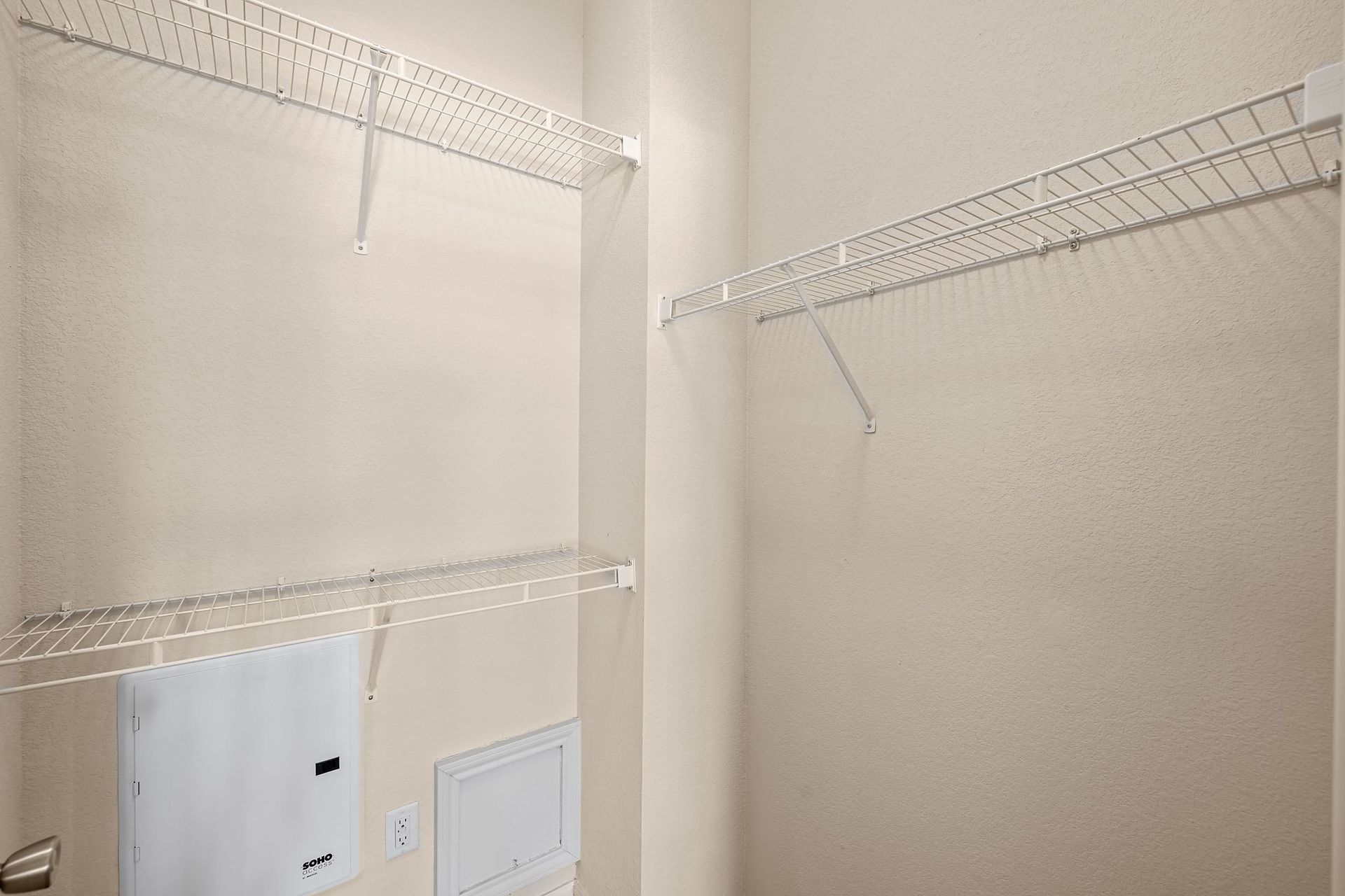 a walk in closet in a 555 waverly unit