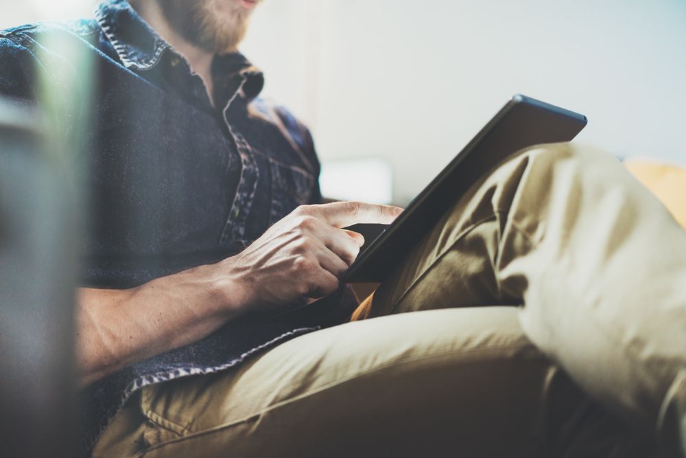 Man Using Digital Tablet