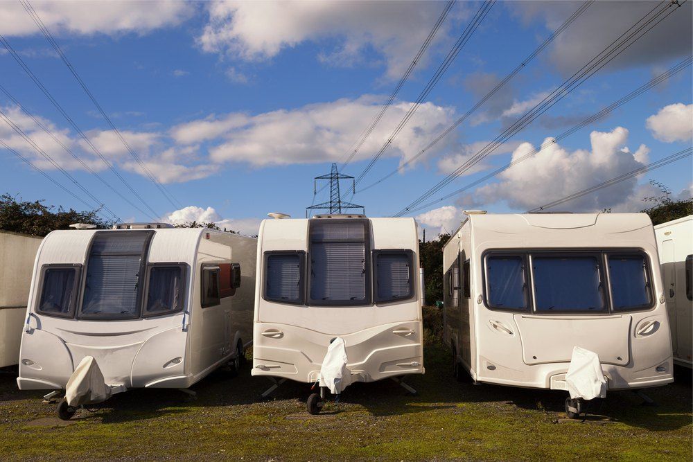 Three Caravans Are Parked Next to Each Other in a Field — Teralba Business & Storage Park in Teralba, NSW