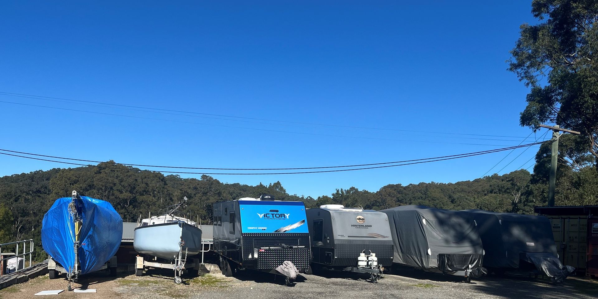 A Rv is Plugged Into a Power Outlet on the Side of It — Teralba Business & Storage Park in Cardiff, NSW