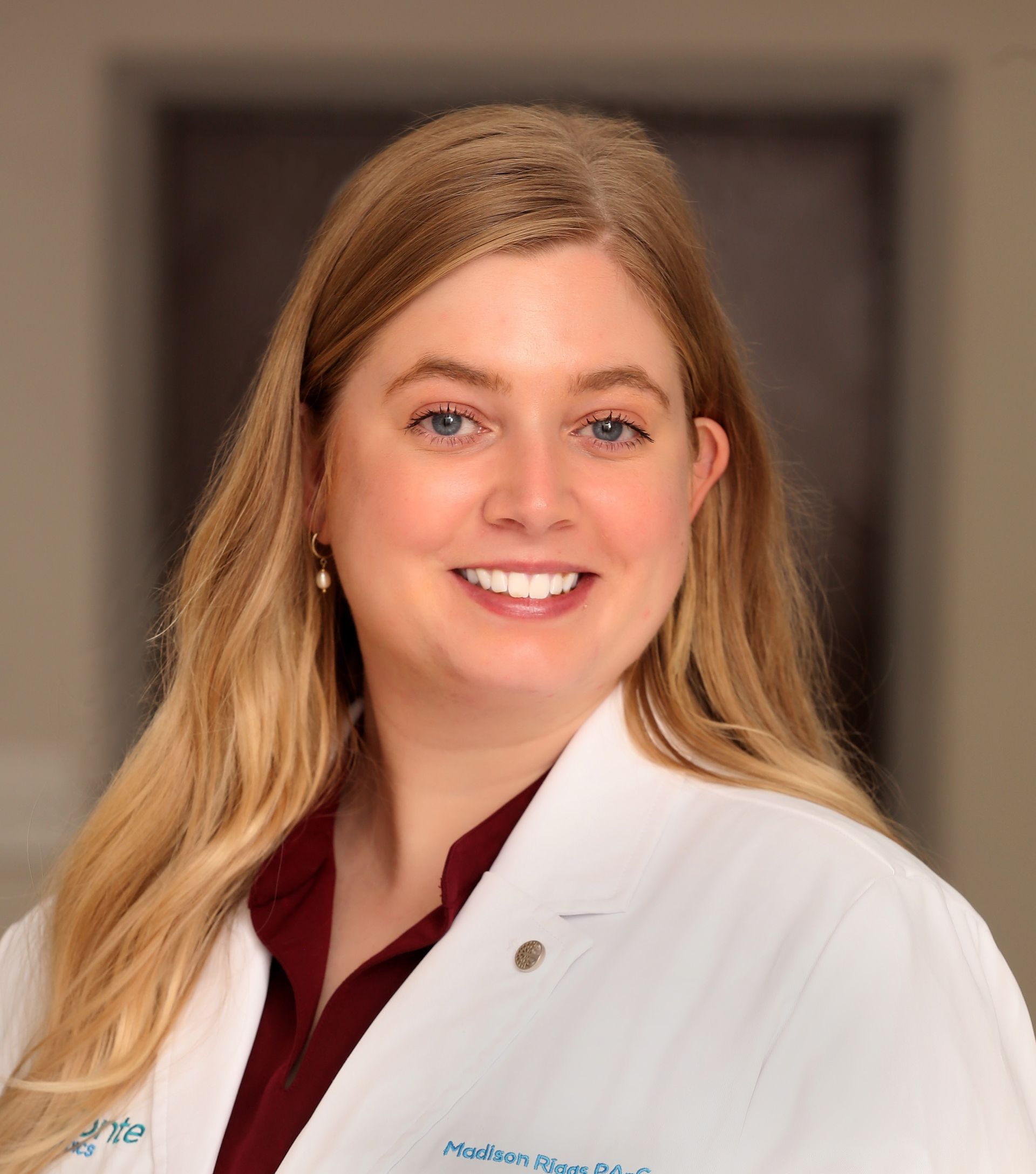 An icon of a woman without a face on a blue background.