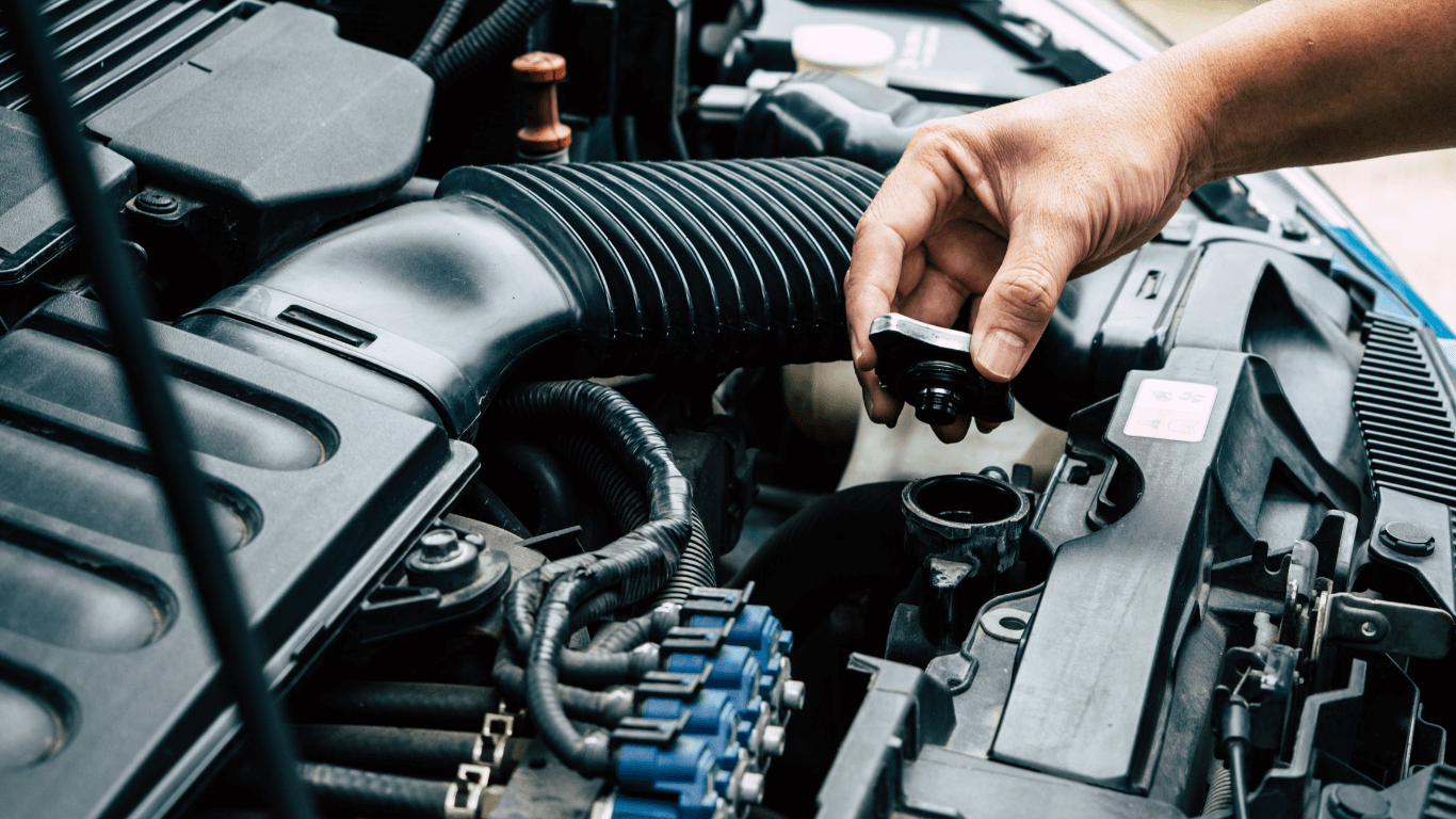 a mechanic doing alternator repair