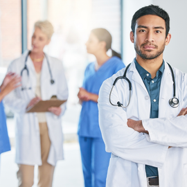 Medical professionals talking about a patient.