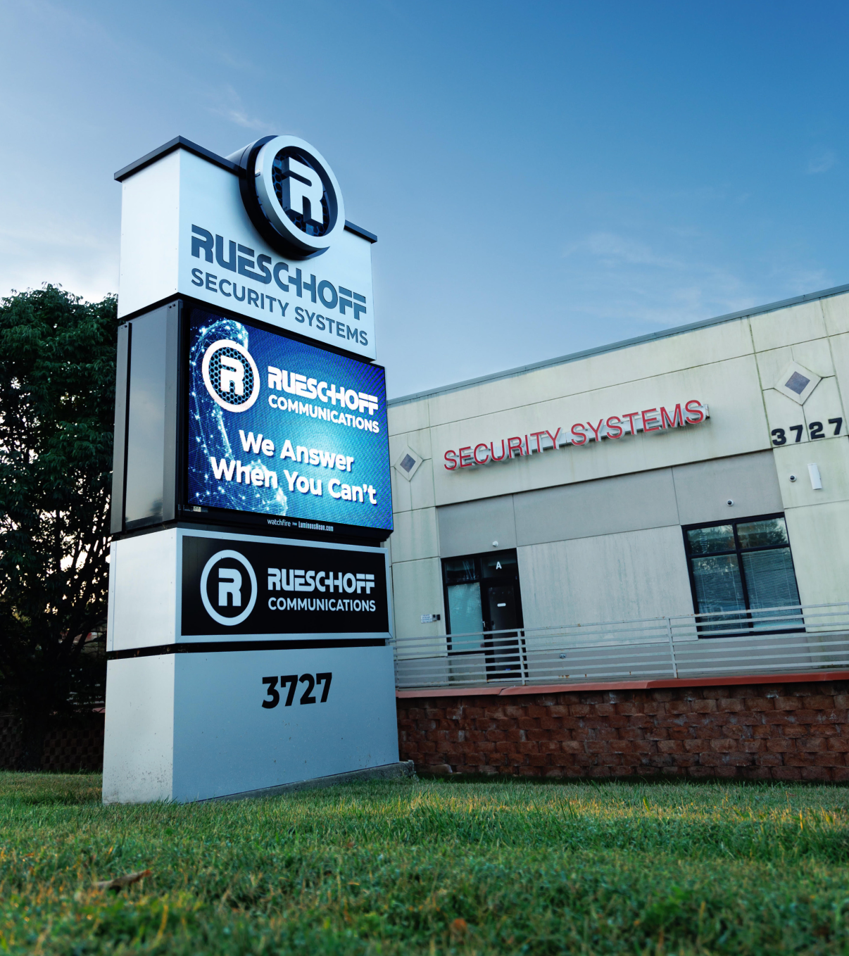 Rueschhoff Communications' sign outside the business. The sign says,