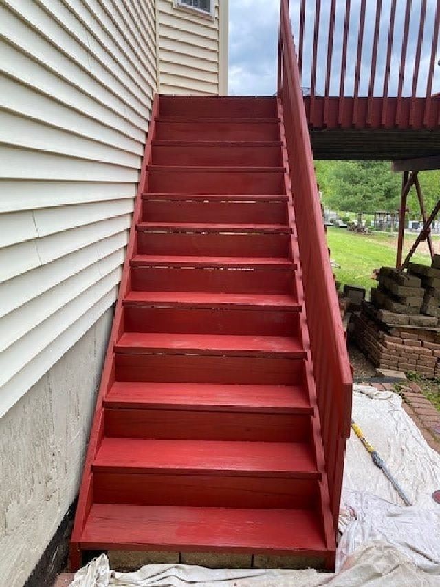 Red Paint of Wooden Stair — Waterbury, CT — Armend's Painting and Home Improvement