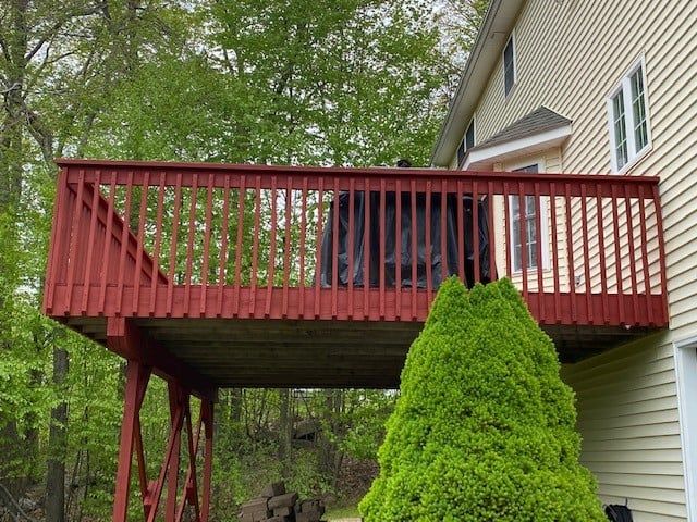 Deck with Red Paint — Waterbury, CT — Armend's Painting and Home Improvement