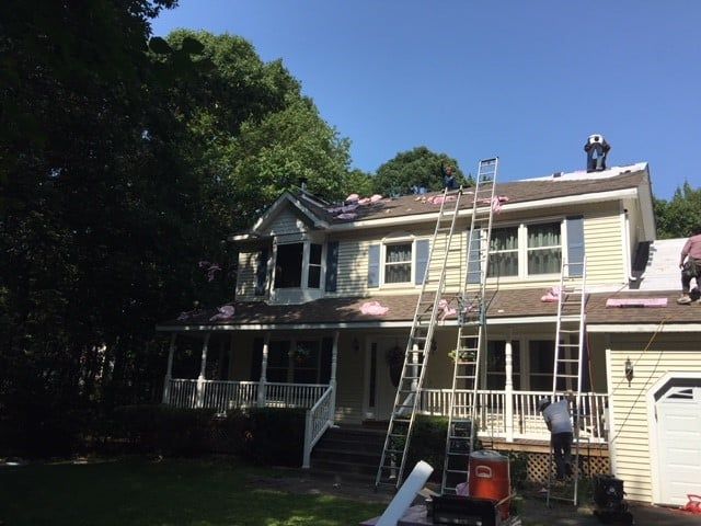 Installing a New Roof — Waterbury, CT — Armend's Painting and Home Improvement