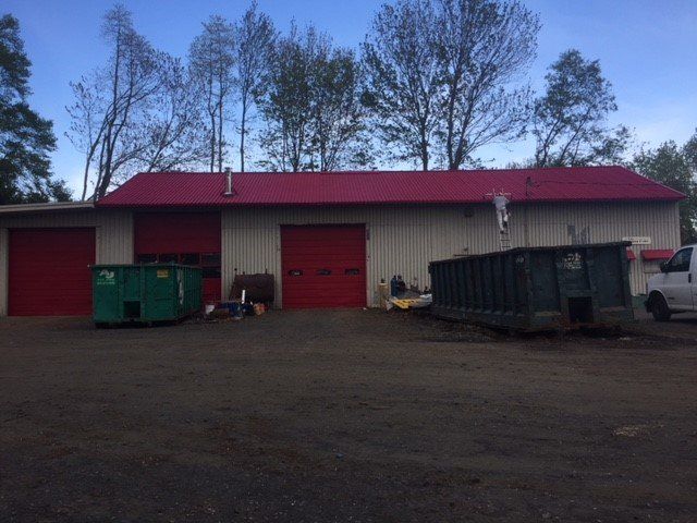 Red Paint of Garage Door — Waterbury, CT — Armend's Painting and Home Improvement