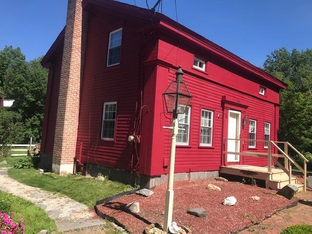 Exterior of Red House — Waterbury, CT — Armend's Painting and Home Improvement