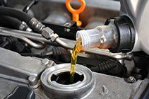 Pouring Motor Oil — Vehicle Repairs in Grafton, NSW