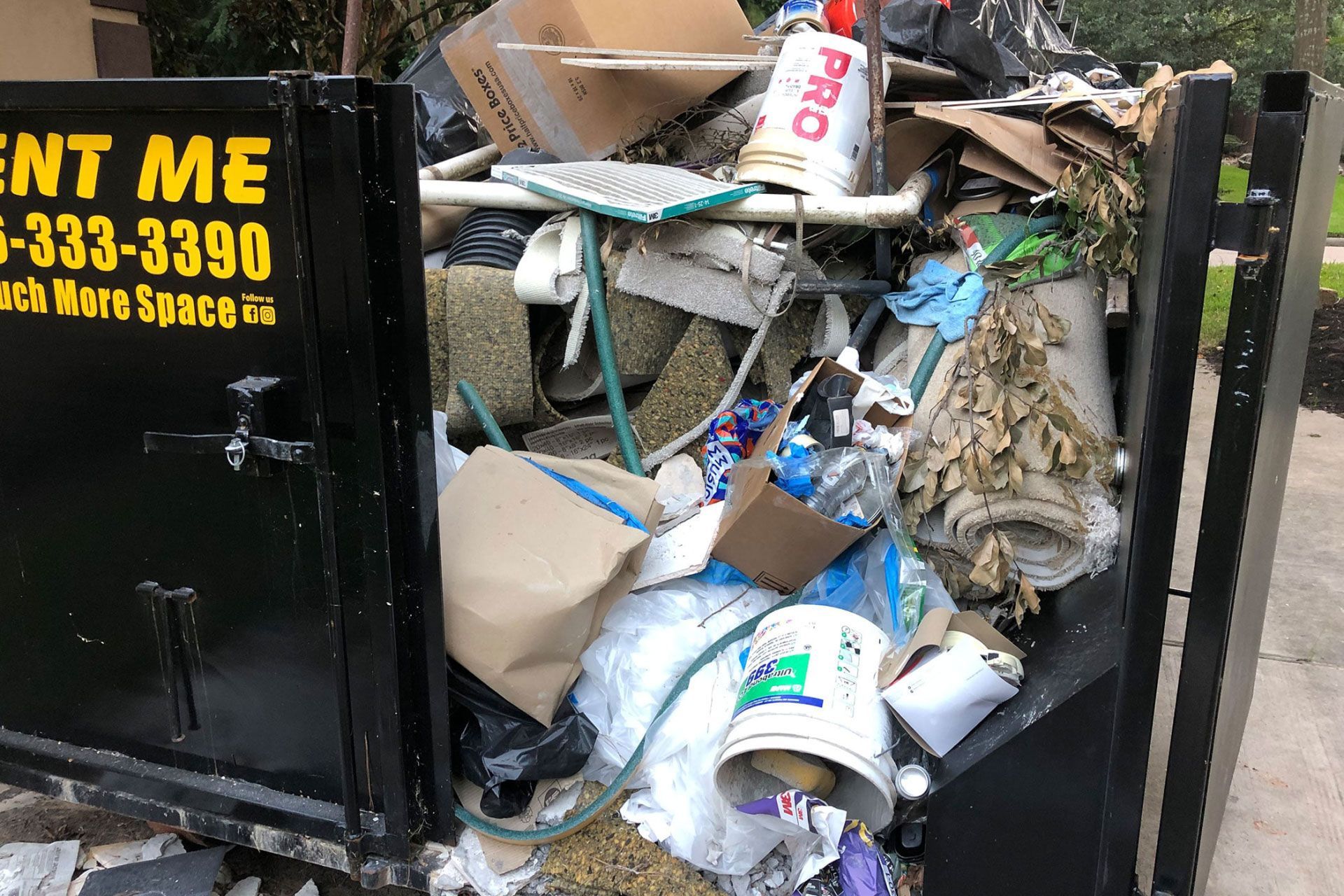 dumpster full of construction debris/junk