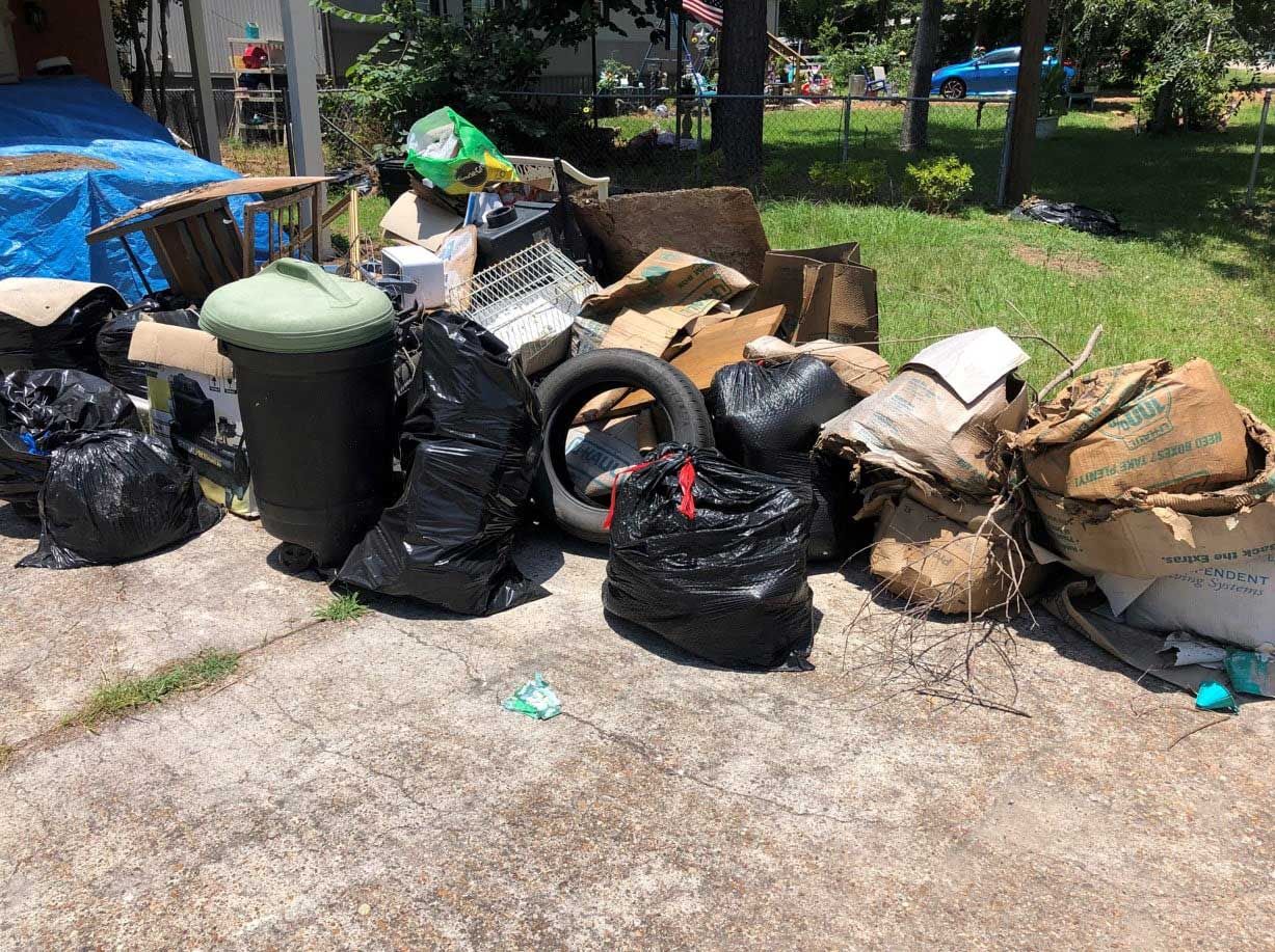 backyard full of junk appliances and house unwanted items