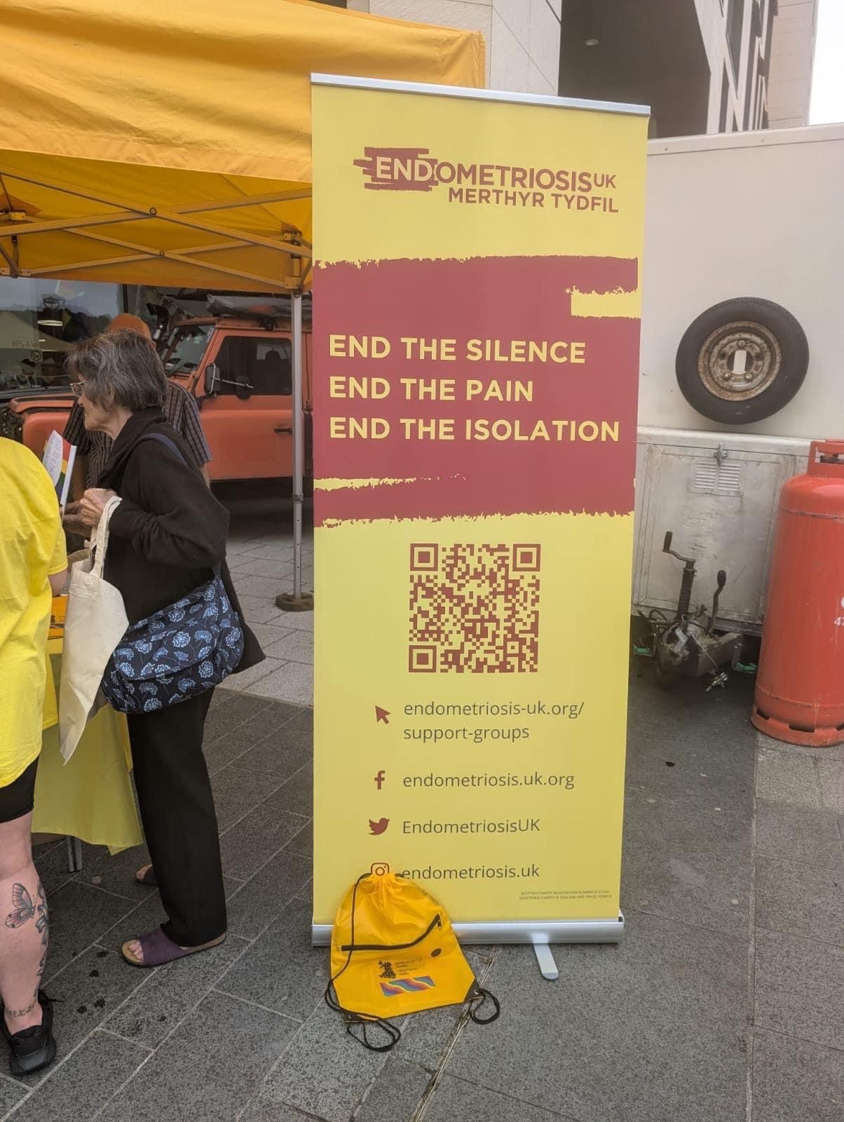 A sign that says end the silence end the pain end the isolation