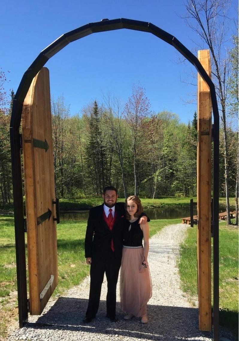 Couple Standing Near Th Door — West Paris, ME — TL Barn
