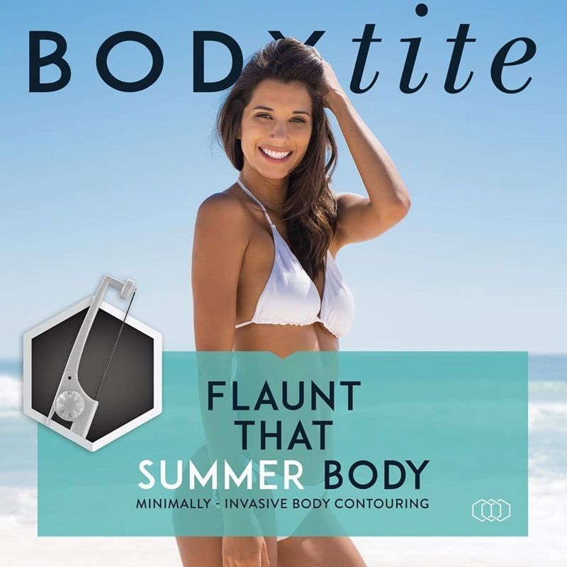 A woman in a bikini is on the cover of a bodytite magazine