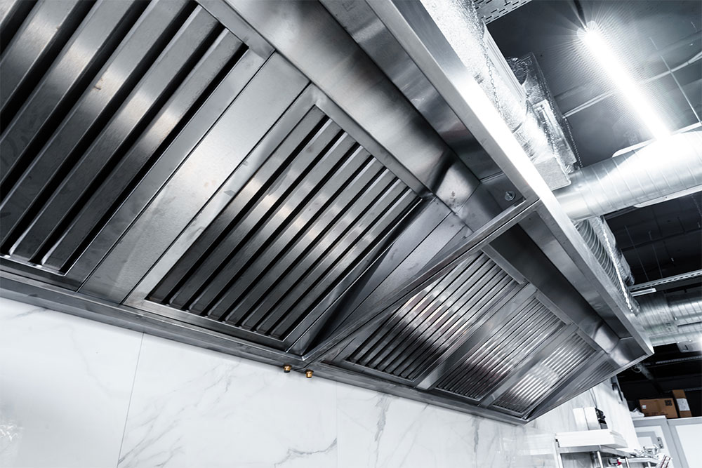 Stainless steel hood in a modern professional restaurant kitchen