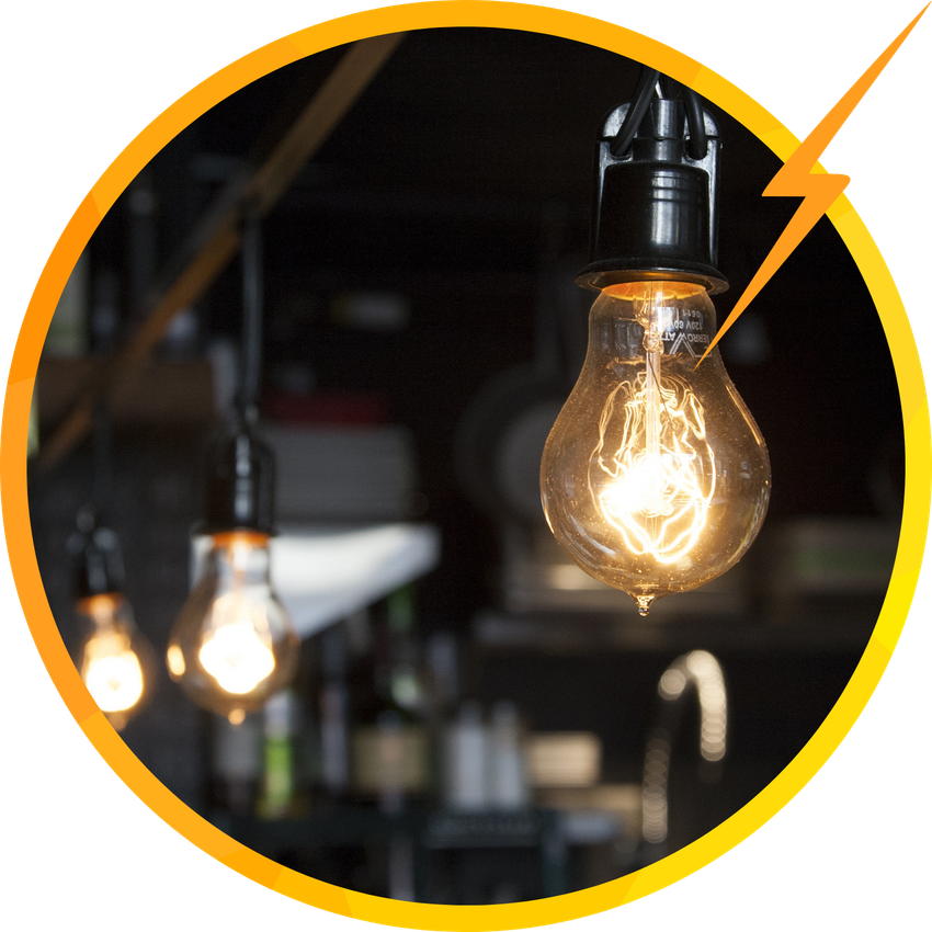Lightbulbs hanging in a dark setting, lit, with a yellow circle and lightning bolt.