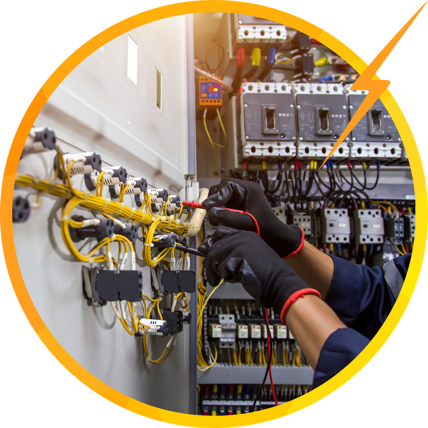 Electrician testing wires in a control panel, wearing black gloves, with a yellow and orange lightning bolt graphic.