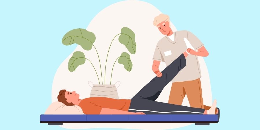 A man is laying on a table getting a chiropractic treatment from a chiropractor.