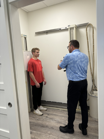 man getting spinal x-rays