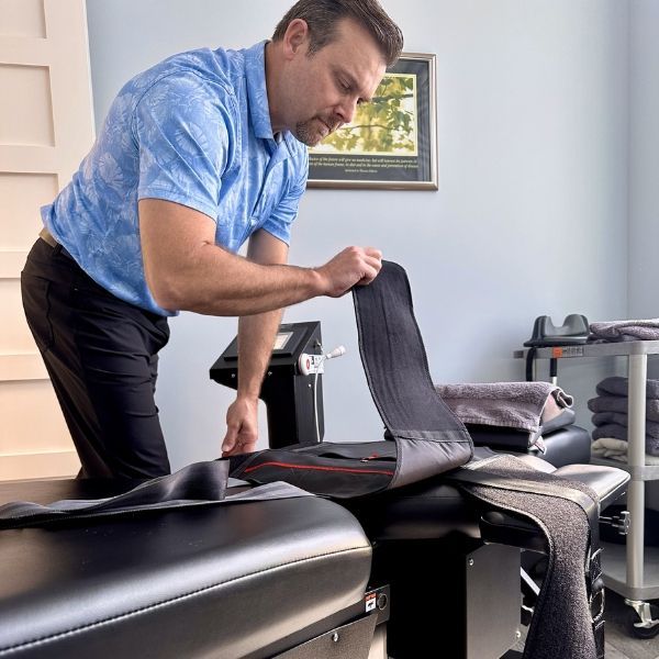 Chiropractor Matt Murdock at The Santa Rosa Office with a spinal decompression table