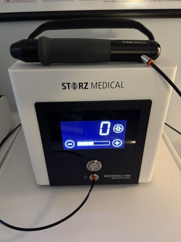 Close-up of shockwave therapy machine used for non-invasive pain treatment