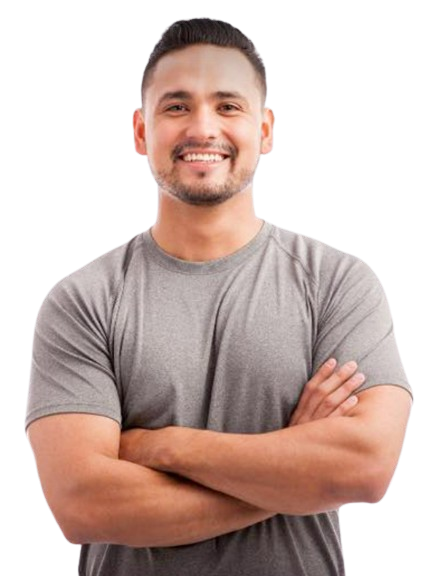 A man in a grey shirt is smiling with his arms crossed after driveway sealer