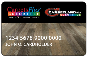 A carpets plus card with a picture of a wood floor