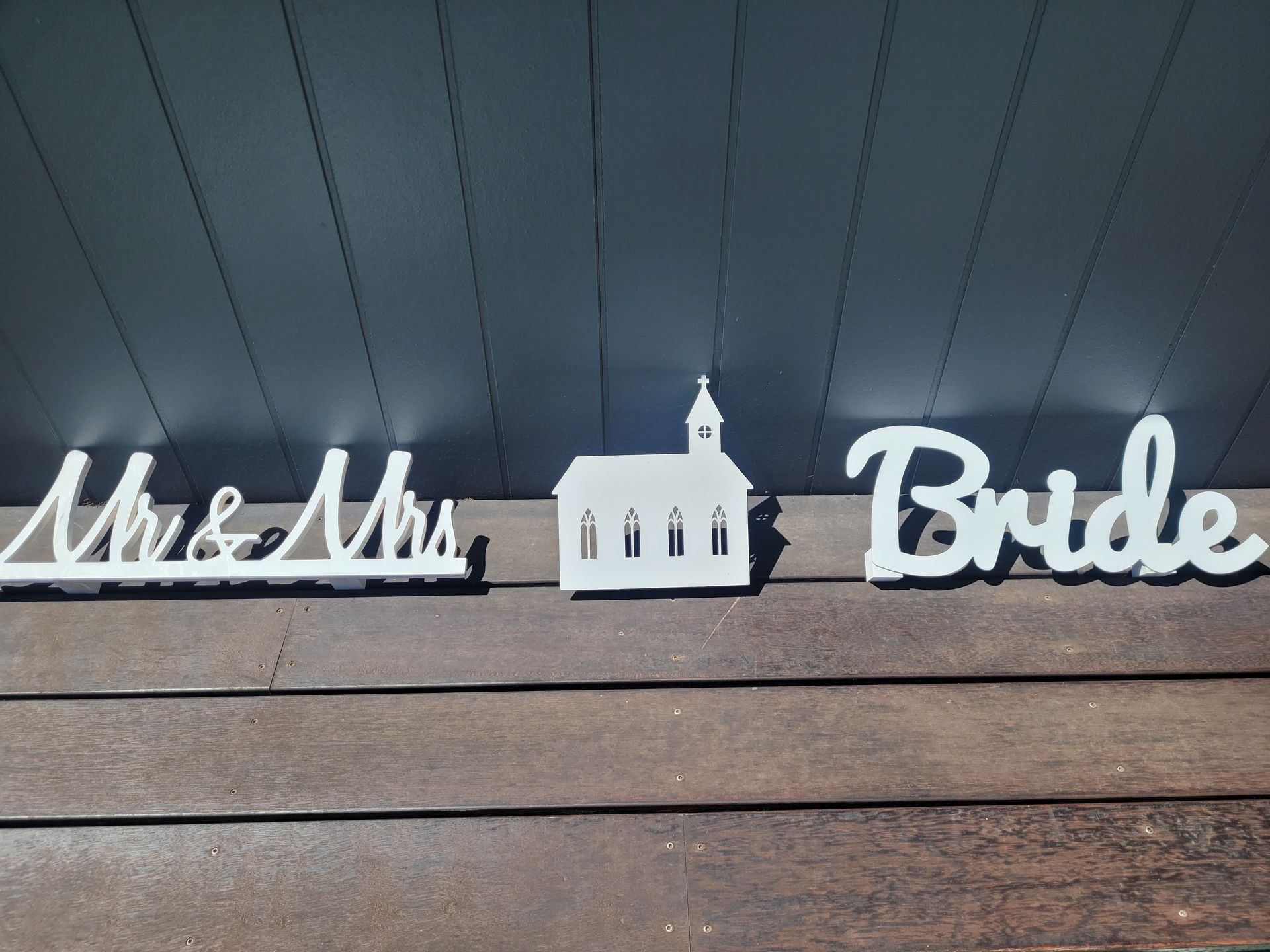 White wooden cutouts: