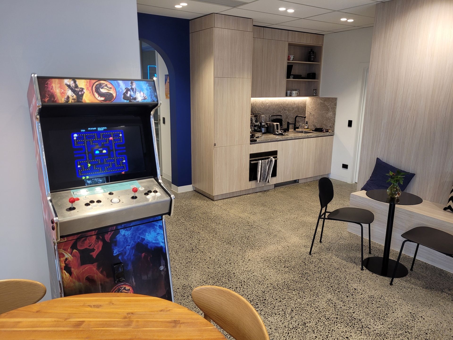 Miniature golf course set up on a grassy lawn, with a central gazebo and several putting greens.