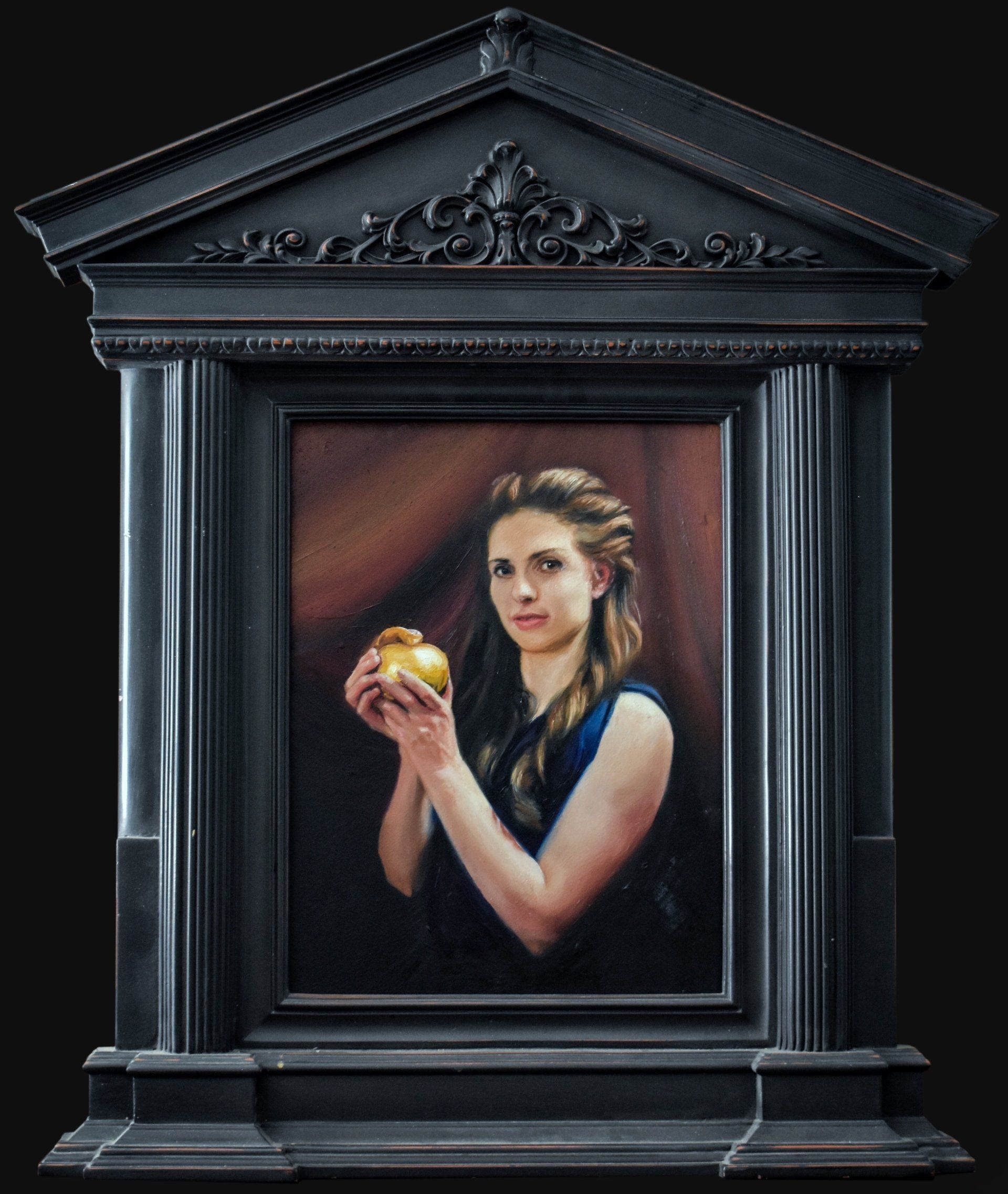 A painting of a woman holding a gold object in a black frame