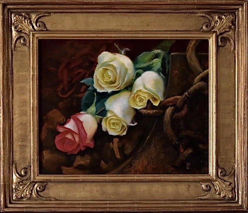 A painting of white and red roses in a gold frame