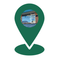 A green pin with a picture of a house inside of it.