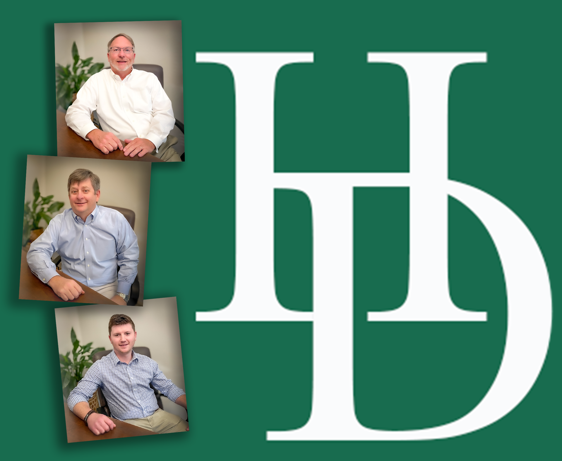 Three men are sitting at a desk in front of a h and d logo