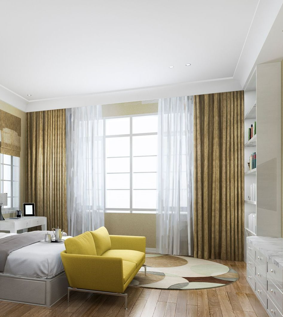 Bedroom with yellow sofa, large window with curtains, and built-in white shelves. Bedroom with yellow sofa, large window with curtains, and built-in white shelves.