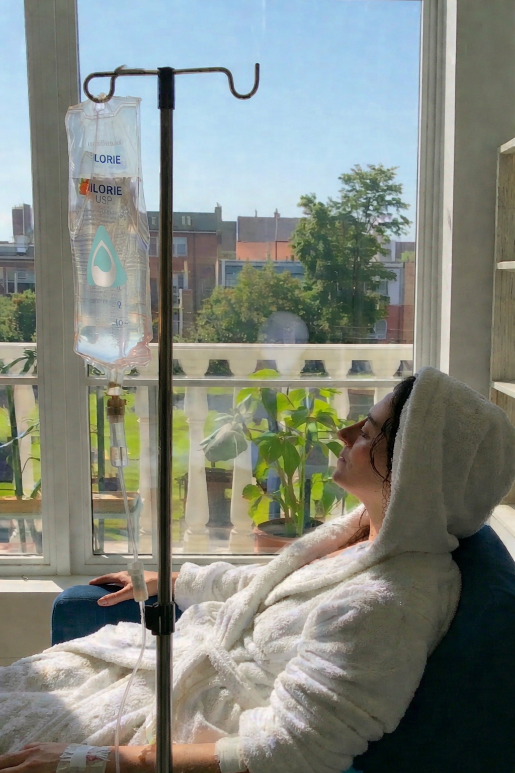 Woman receiving AQUA MD Mobile IV therapy for POTS in Kitsap County, WA