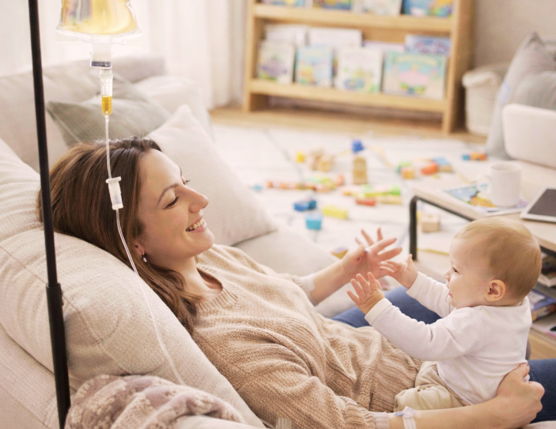 Parent caring for child at home while receiving mobile IV hydration therapy from AQUA MD for illness recovery in Bremerton, WA.