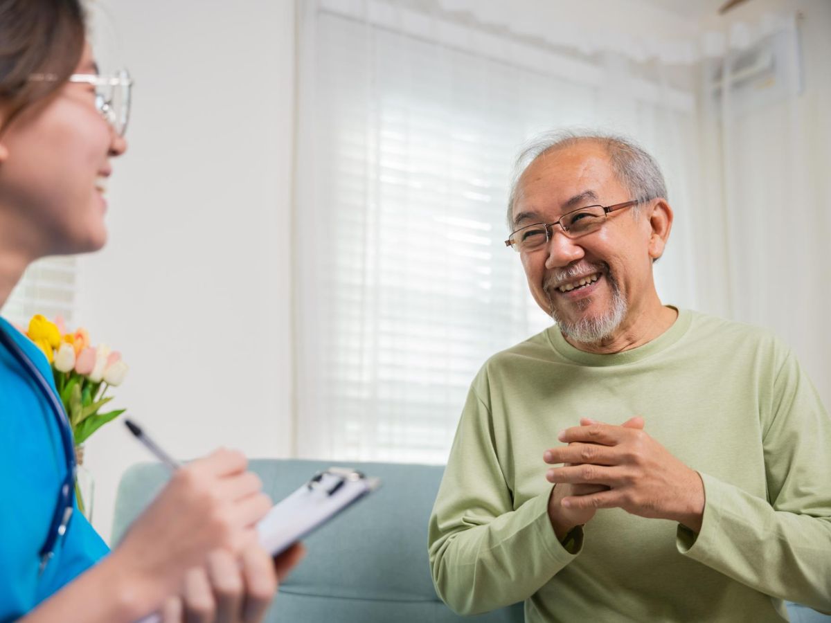 A senior patient converses with his physician about the metabolic panel test