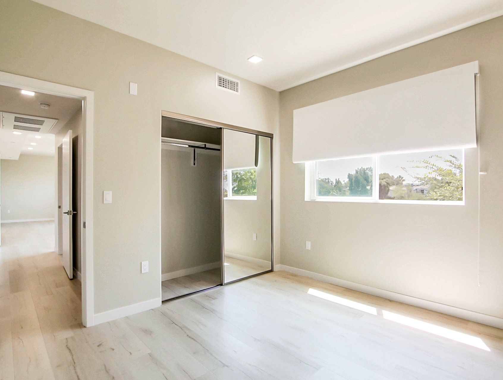 Modern bedroom with hardwood floors