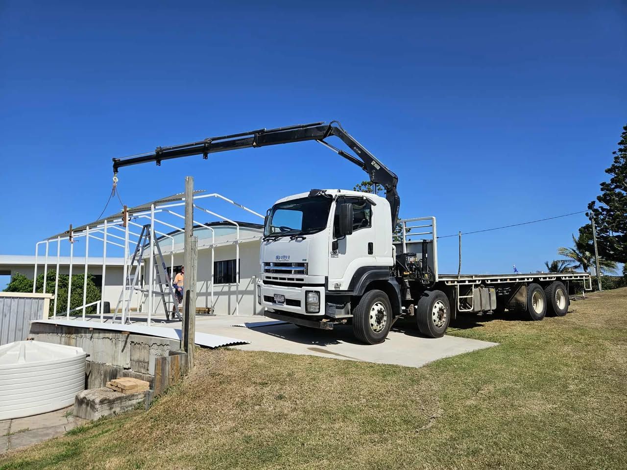 A Mechanic Is Working On The Engine Of A Semi Truck — Keppel Coast Diesel In Maryvale, QLD