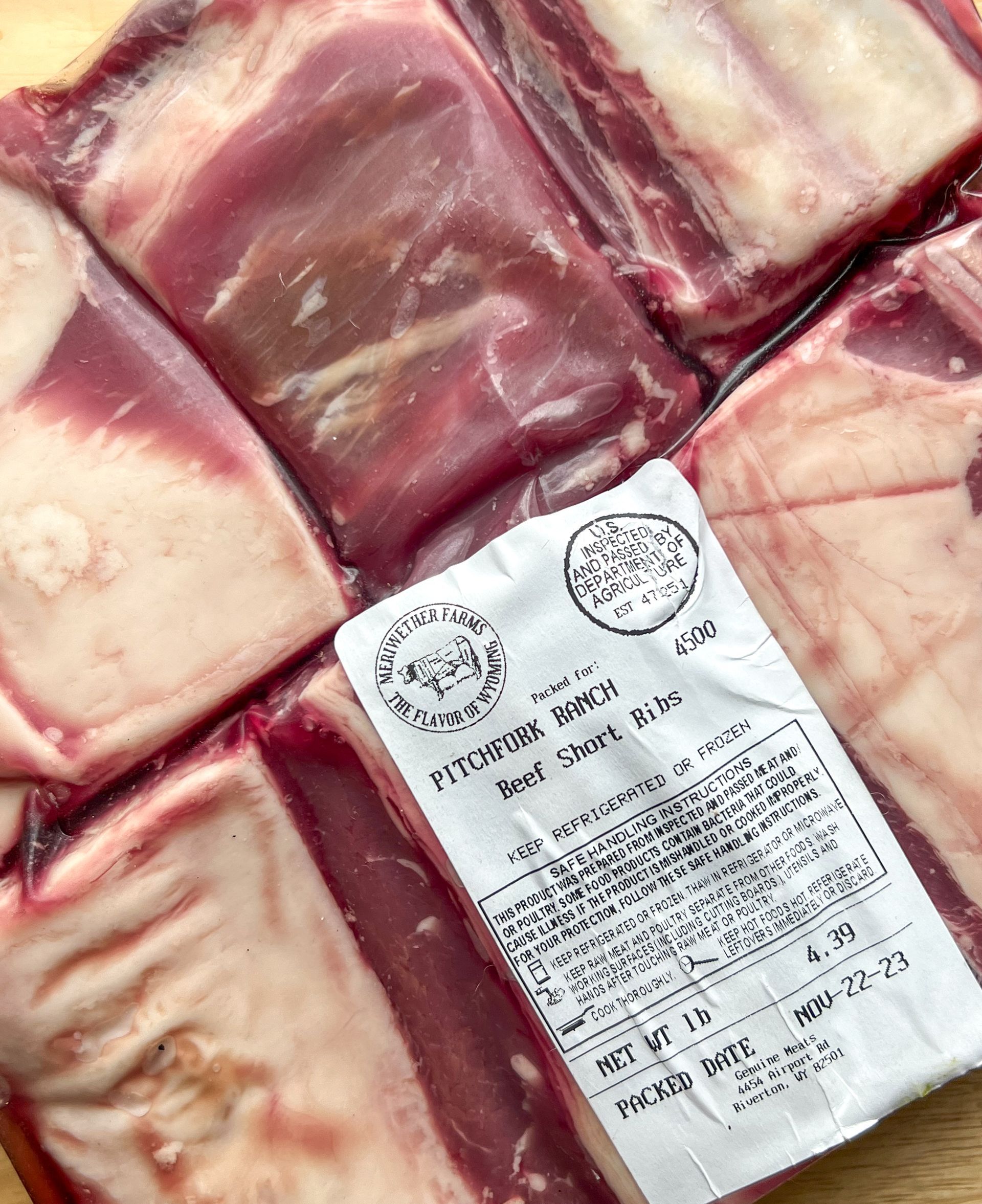 A close up of a package of meat with a label on it